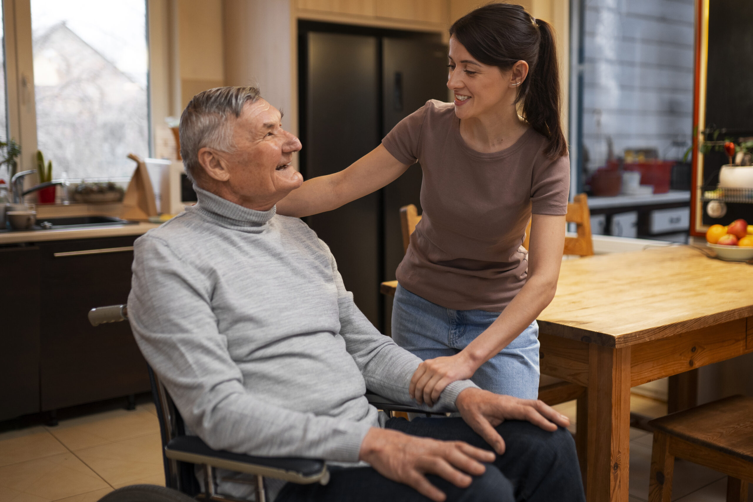 Licensed in-home caregiver assisting an elderly individual in Renton WA